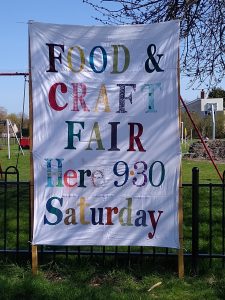 Food and Craft Fair Banner raised in Great Wilbraham