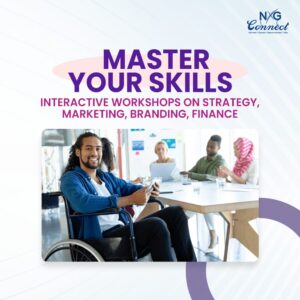 Young man in a wheelchair at a table in a group training situation with 4 other young people in the background. Promoting interactive business skills workshops